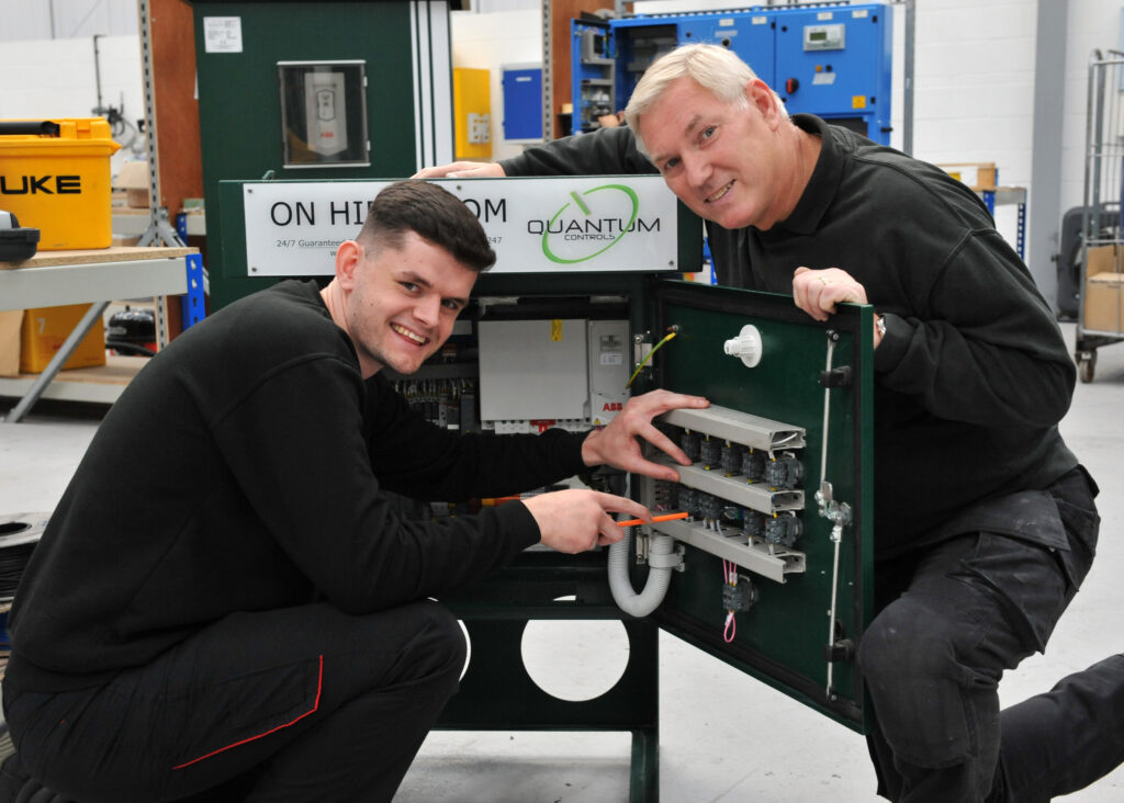 Quantum Controls apprentice Kieran Fontaine, with mentor Ralph Patterson.