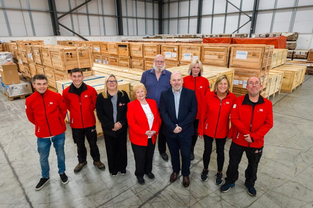 Cllr Margaret Meling, lead member for economic growth and transport at South Tyneside with Phil Hood, Branch Manager at LV Newcastle, and staff at the new LV Logistics distribution hub in Hebburn