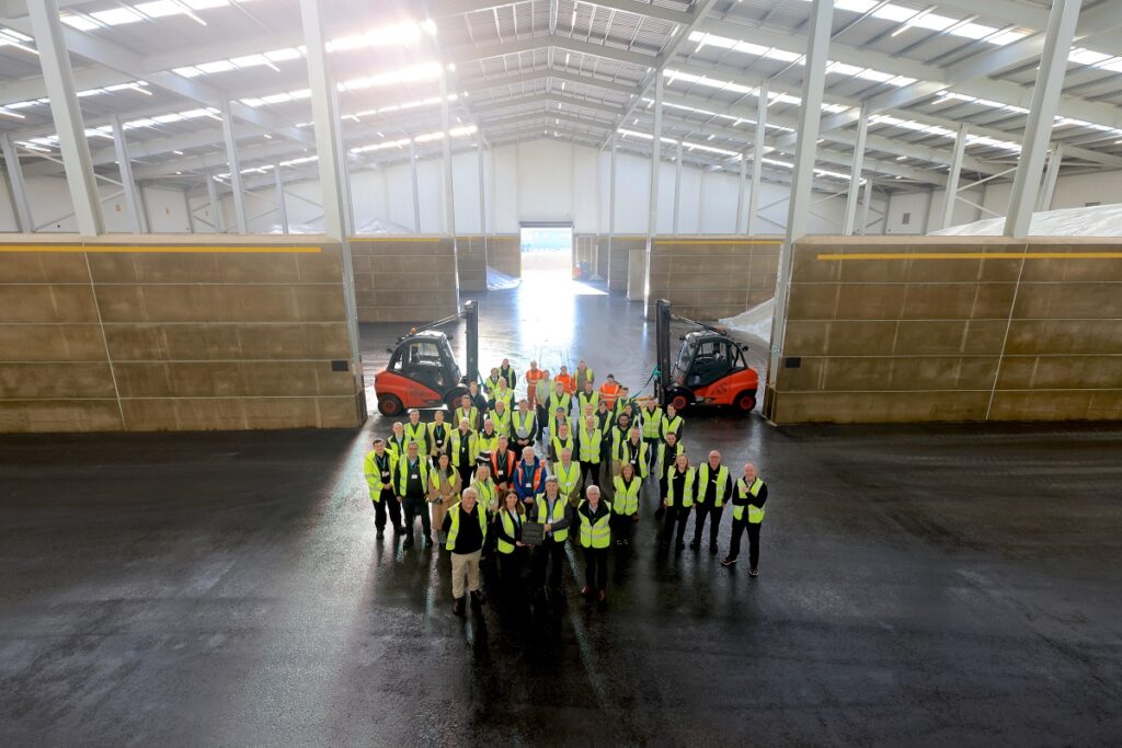 Ashley Nicholson, Chief Business Officer Port of Tyne and Sean Coyle, CEO, Origin Enterprises alongside employees from Port of Tyne and Origin Soil Nutrition