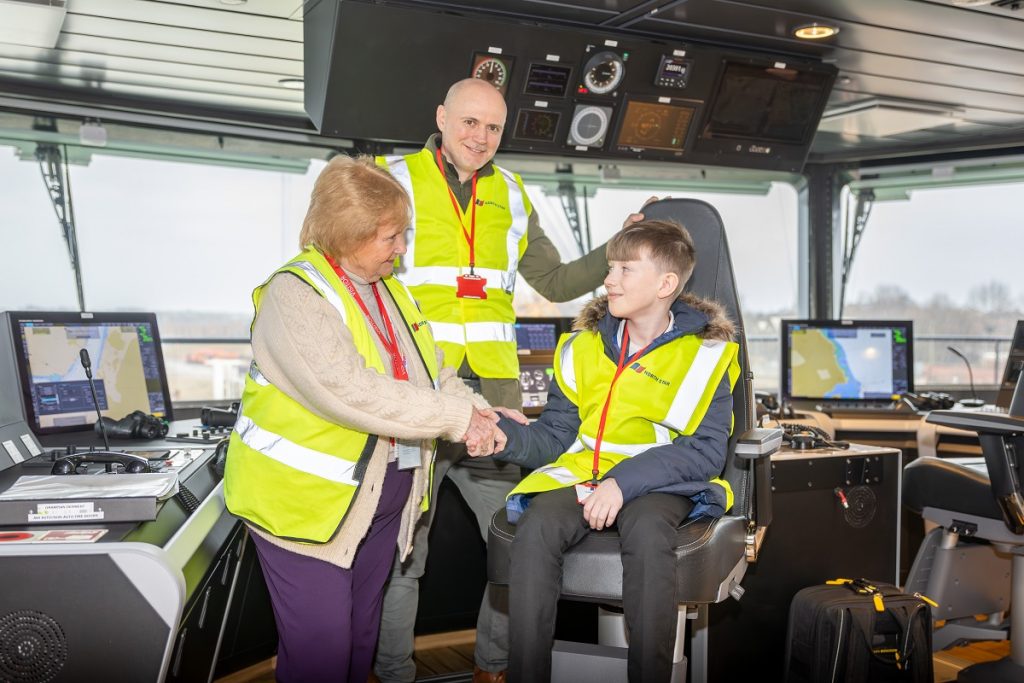Cllr Margaret Meling, Lead Member for Economic Growth and Transport for South Tyneside Council; Dominic Wilcox, Chief Inventor, Little Inventor Harris in the Captain's seat on board North Star's Grampian Derwent.
